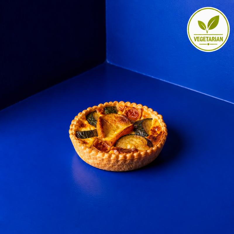 Vegetarian homemade Quiche with goat cheese and zucchetti