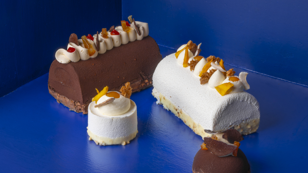 chocolate orange Yule Log, blood orange Yule log cake, Christmas Yule log, dark chocolate Yule log, citrus chocolate dessert, holiday chocolate cake, festive bûche de Noël exotic coconut mango passion fruit